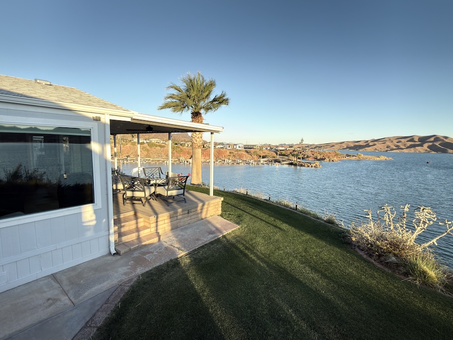 Lakefront hotel room patio in Lake Havasu with scenic water views near popular attractions and outdoor activities.
